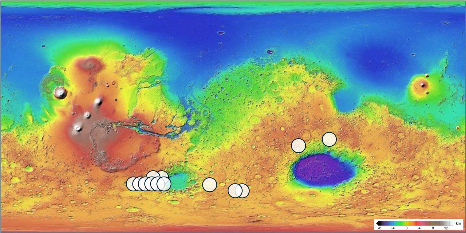 Global map of Mars with 13 white circles marking regions whose mineralogy and chemistry match the Teghaza 001 meteorite.