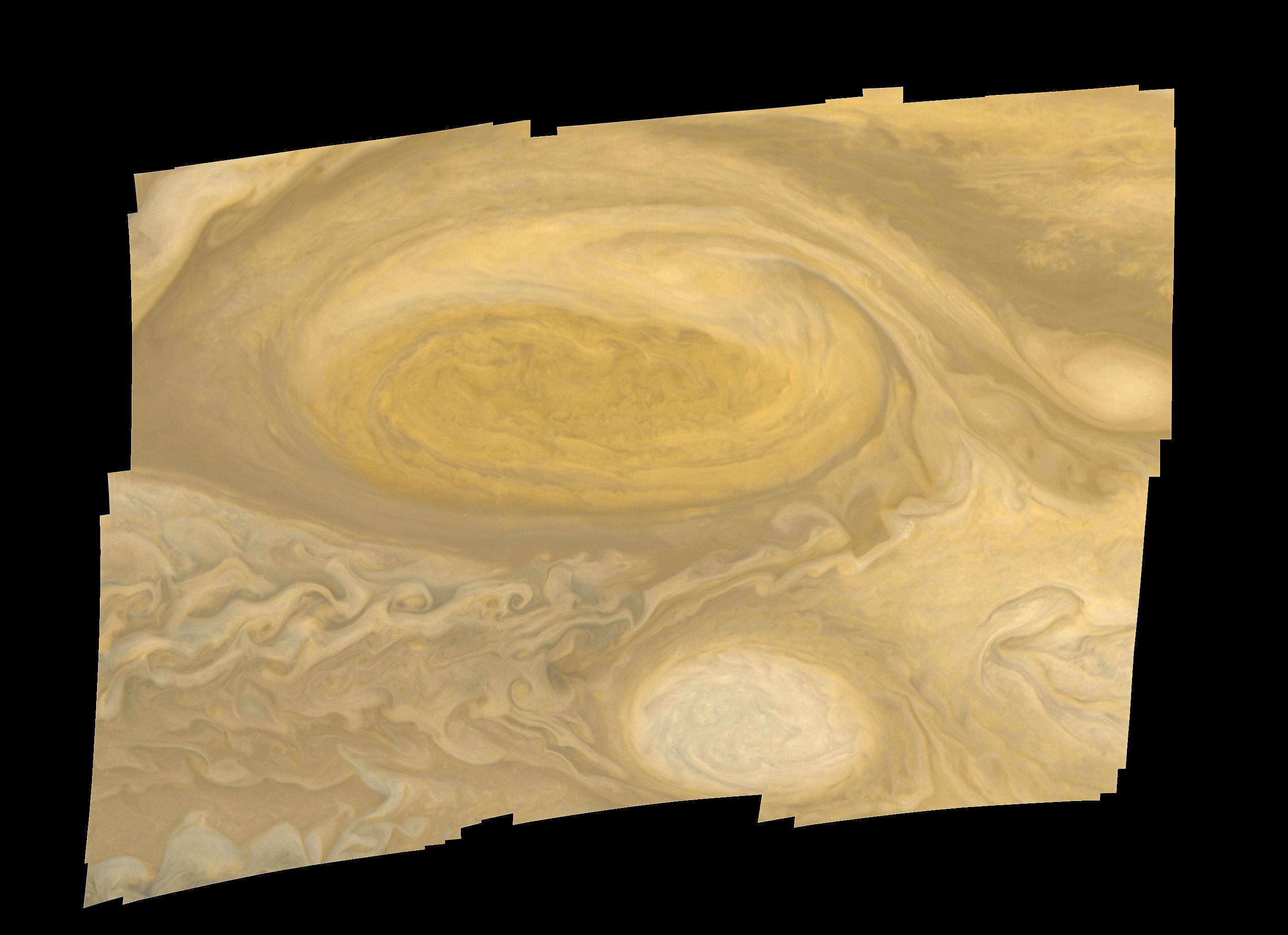 Vue rapprochée de Jupiter par Voyager 1 : la Grande Tache rouge, une tempête plus large que la Terre, se détache sur les bandes nuageuses ocre et blanches.