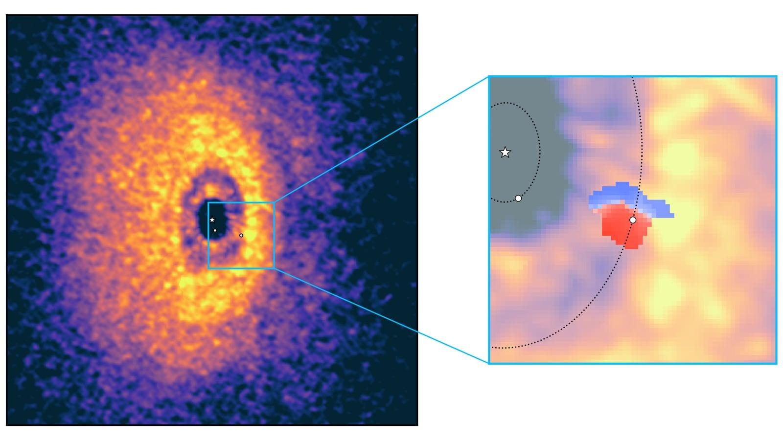 False-color image of the gas disk around the star WISPIT 2, where bluish and reddish patches mark gas moving toward or away from us, around a young planet.